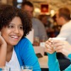 Friends drinking coffee in well insured coffee shop, cafe or restaurant